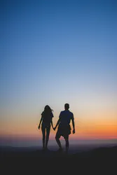 Silhouette Sunset Beach Couple - Caleb Ekeroth